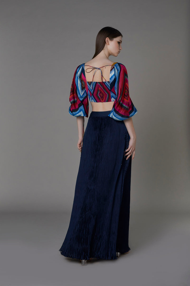 Saaksha & KinniÂ    I   Pink blue big diamond bustier with attached balloon sleeves

Navy blue non print pleated skirt Blouse - Satin

Skirt - Chiffon Blouse - Pink / blue

Skirt - Navy Blue   SS22102

  SS22103 - Shop Cult Modern