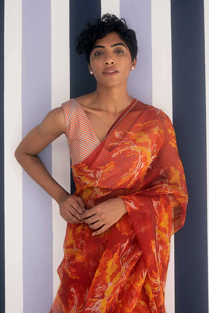 YAM   I   Poble HAWAI SAREE 1

(SAREE)

[BLOUSE STITCHED/ UNSTITCHED NOT INCLUDED] SILK ORGANZA RED YAMSR26 - Shop Cult Modern