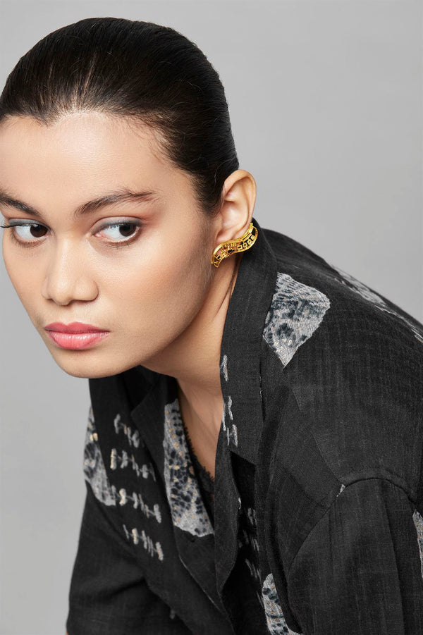 Roma Narsinghani Maya Studs Earrings The piece is set in brass, with 18KT gold finesse. Each piece is unique and handcrafted by our artisans. RNLOVE04 - Shop Cult Modern