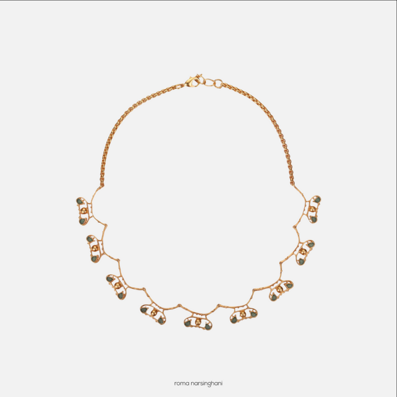 Roma Narsinghani Infinity choker Choker The piece is set in brass, hand enameled with 18KT gold finesse. Each piece is unique and handcrafted by our artisans. RNLOVE18 - Shop Cult Modern